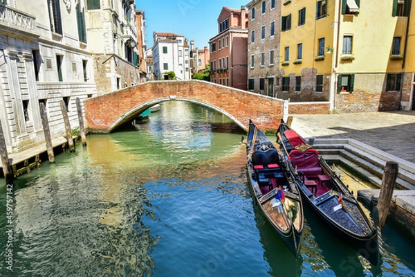 Fototapeta Gondola on the canal in Venice, typical Italy architecture