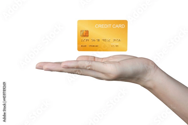 Fototapeta Credit card floating in the hand of a business woman on white background.	