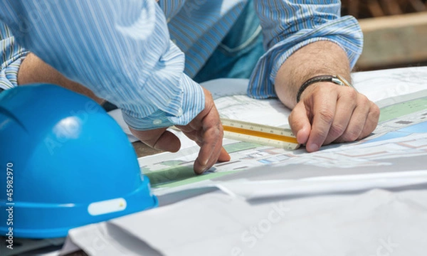 Obraz Discussing construction plans