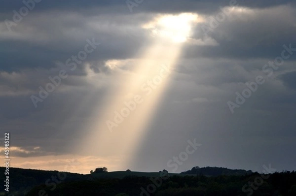 Obraz Ray of sunlight breaking through