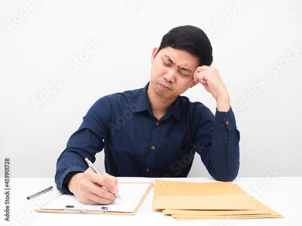 Obraz Asian man writing on document board and feeling strain white background
