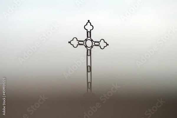 Fototapeta Silhouette of Cross in the fog 