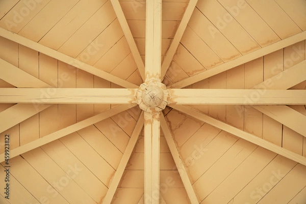 Fototapeta Fragment of elements of the ceiling of a street gazebo.