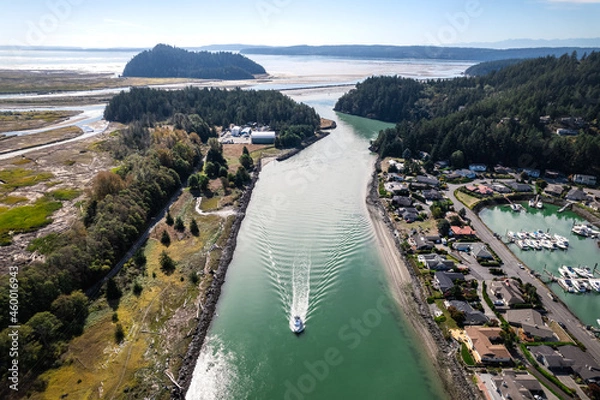 Fototapeta Boat Traveling Up Swinomish Channel in La Connor Washington