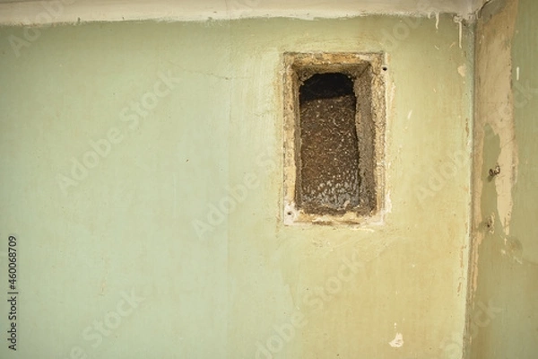 Fototapeta old air ventilation on the wall in the kitchen