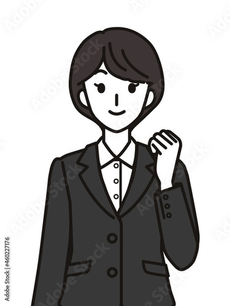 Fototapeta ガッツポーズのスーツを着た女性