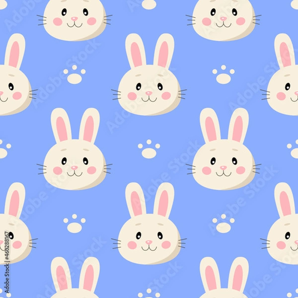 Fototapeta Seamless pattern with cute cartoon rabbits and paws isolated on blue background