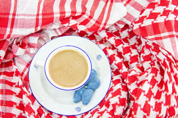 Obraz Turkish coffee,red authentic tablecloth,blue almonds,top view