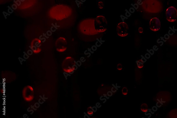 Obraz Background of water droplets on the surface with black and red.