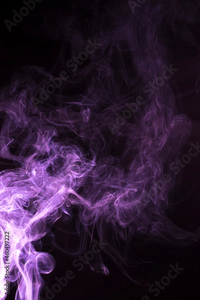 Obraz The movement of pink smoke takes place on a fierce black background, fearing an abstraction on a black background.