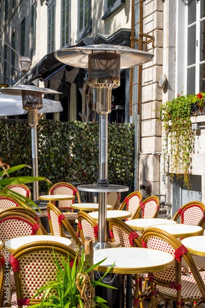 Fototapeta gas heater in a street cafe