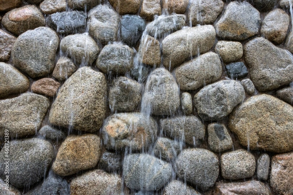 Obraz water peacefully falling over rock wall