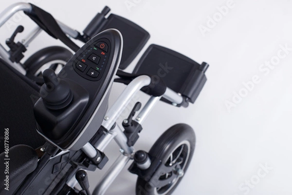 Fototapeta Motorized Electric wheelchair for senior elder patient who cannot walk, isolated