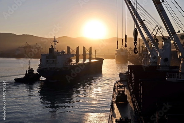 Obraz Various sunrise views of the piers, terminal and coastline of the Port of Vostochnyy. Russia, December,2020