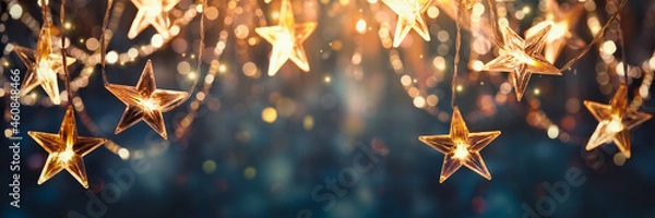 Obraz Gold Star Light wiszące na ciemnym tle