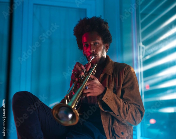 Obraz Young trumpeter performs at home