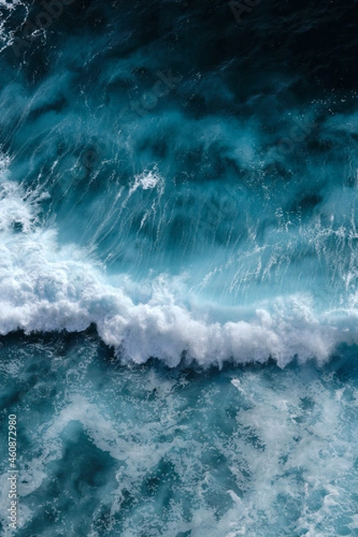 Fototapeta Aerial view to seething waves with foam. Waves of the sea meet each other during high tide and low tide