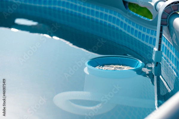 Fototapeta A skimmer for the pool. A device for cleaning the pool from debris and leaves.