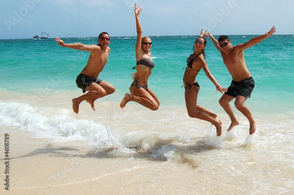 Obraz People jumping in the ocean