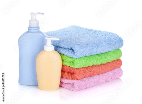 Fototapeta Cosmetics bottles and towels