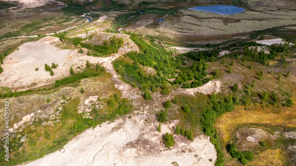 Fototapeta Landscape of the forest-tundra and the sandy river bank, photo from quadrocopter, bird's eye view, beautiful ravines of unusual shape.Arctic Circle, tunda