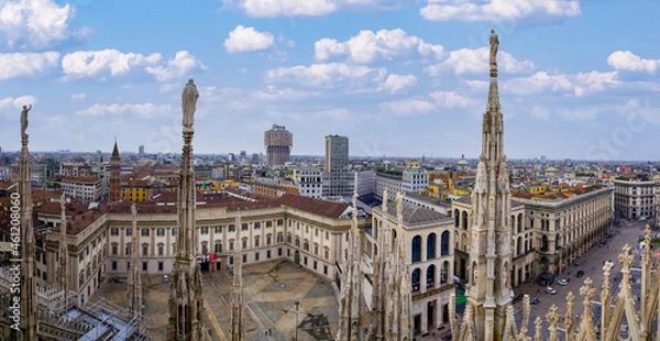 Fototapeta Overview of the Milan Cathedral seen from above. Duomo of Milan at sunset and in daylight.