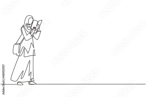 Fototapeta Continuous one line drawing young Arabian lady with hijab and trendy bag holding book. Girl reading function book or schoolbook. Student, bibliophile, literature fan. Single line draw design vector