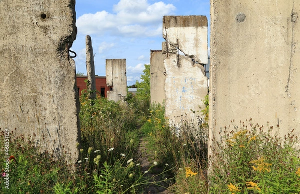 Fototapeta Remnants of the Berlin Wall. Six pieces are on display in an outdoor garden in Truro, Nova Scotia, Canada.