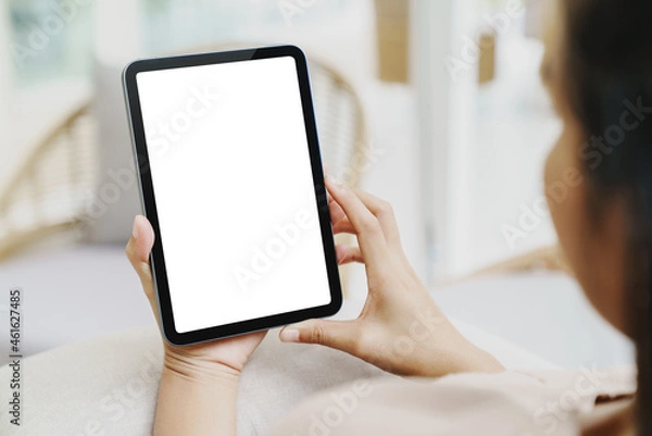 Fototapeta woman using digital tablet rear view shot