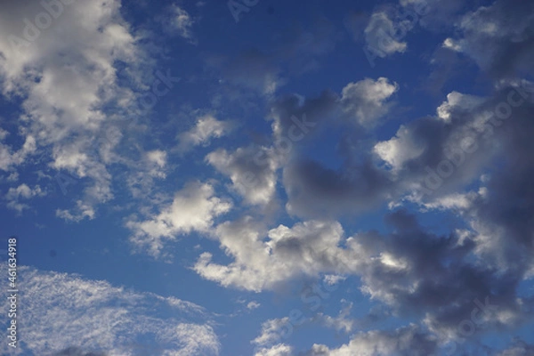 Obraz Fluffy white clouds and blue sky