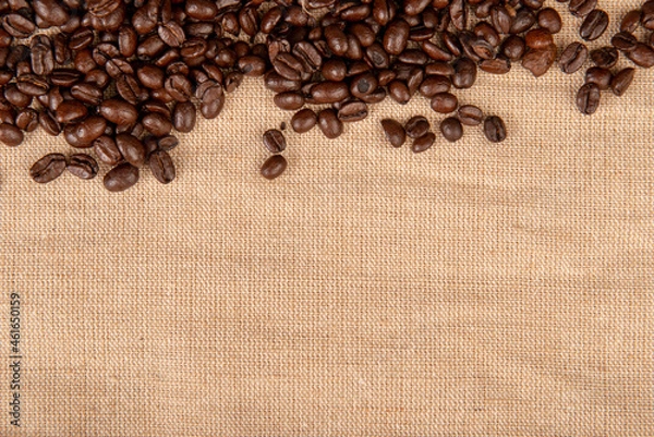 Obraz Coffee been on rustic canvas background