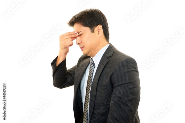 Fototapeta 疲れた表情のビジネスマン
