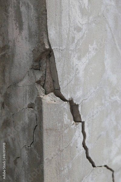 Fototapeta Broken concrete pole. Cause damage and dangerous to house. Concept of destruction of infrastructure.