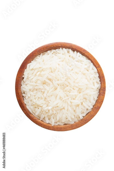 Fototapeta Top view of uncooked dry rice in wooden bowl isolated on white with clipping path.