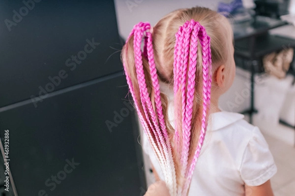 Obraz Colored  braids in a pink shade in a hairstyle on a blonde girl