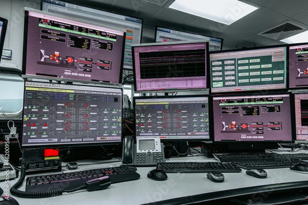 Fototapeta Process control In the System Monitoring Room or control room Work on many monitor. Facility is Full of Screens Showing plant process