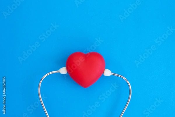 Obraz red heart on blue background