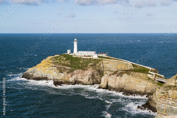 Fototapeta Waves crash around outh Stack Lighthouse