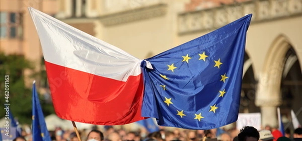 Fototapeta European union flag tied together with flag of Poland during street demonstration to support Poland's membership in EU