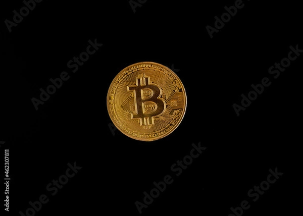 Obraz Bitcoin crypto coin captured against back background
