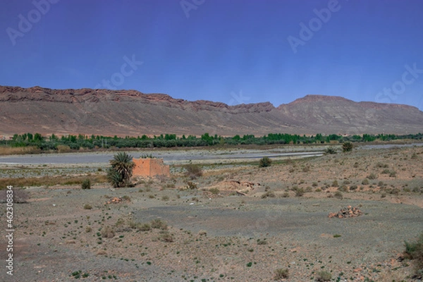 Obraz Africa Morocco desert Atlas mountains nature rock landscape with river palm under blue sky hot weather 