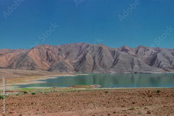 Obraz Africa Morocco desert Atlas mountains nature rock landscape with river palm under blue sky hot weather 