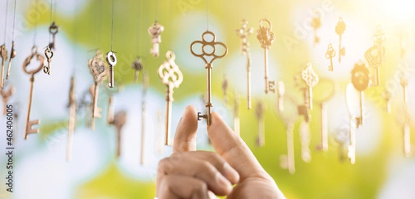 Obraz isolated vintage old golden and bronze key, successful concept
