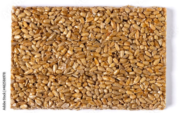 Fototapeta Rectangular tile of sunflower kozinak. Isolated on white background. Close-up. Top view.