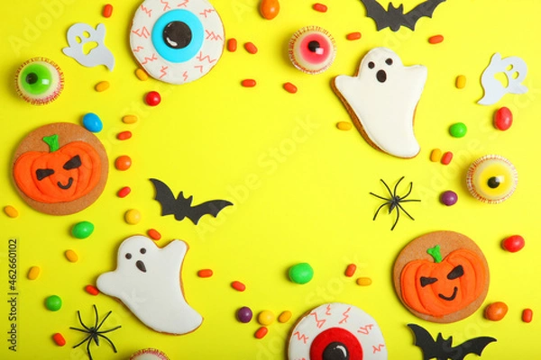 Fototapeta Halloween sweets on colored background close up top view with place for text