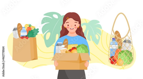 Fototapeta Girl holding  bag with green grocer. Set of reusable bags and cardboard box of fruits, vegetables, milk, bread. Food products in reuse eco and paper package.Organic products from farm.