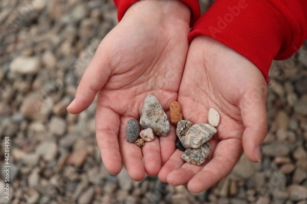 Obraz human hands and stones