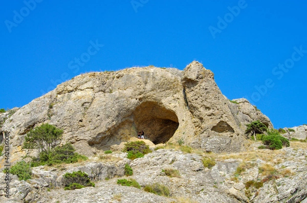 Fototapeta Mountain grotto Aeolian Harp on ecological trail Alchak-Kaya on Alchak Cape in Sudak, Crimea