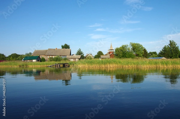 Fototapeta Velikogubskoye rural settlement, Medvezhyegorsky District, Karelia, Russia  - July, 2021: Saints Peter and Paul Chapel, Volkostrov