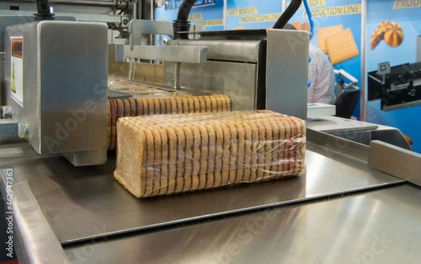 Obraz Biscuits in packaging on an automatic packaging line